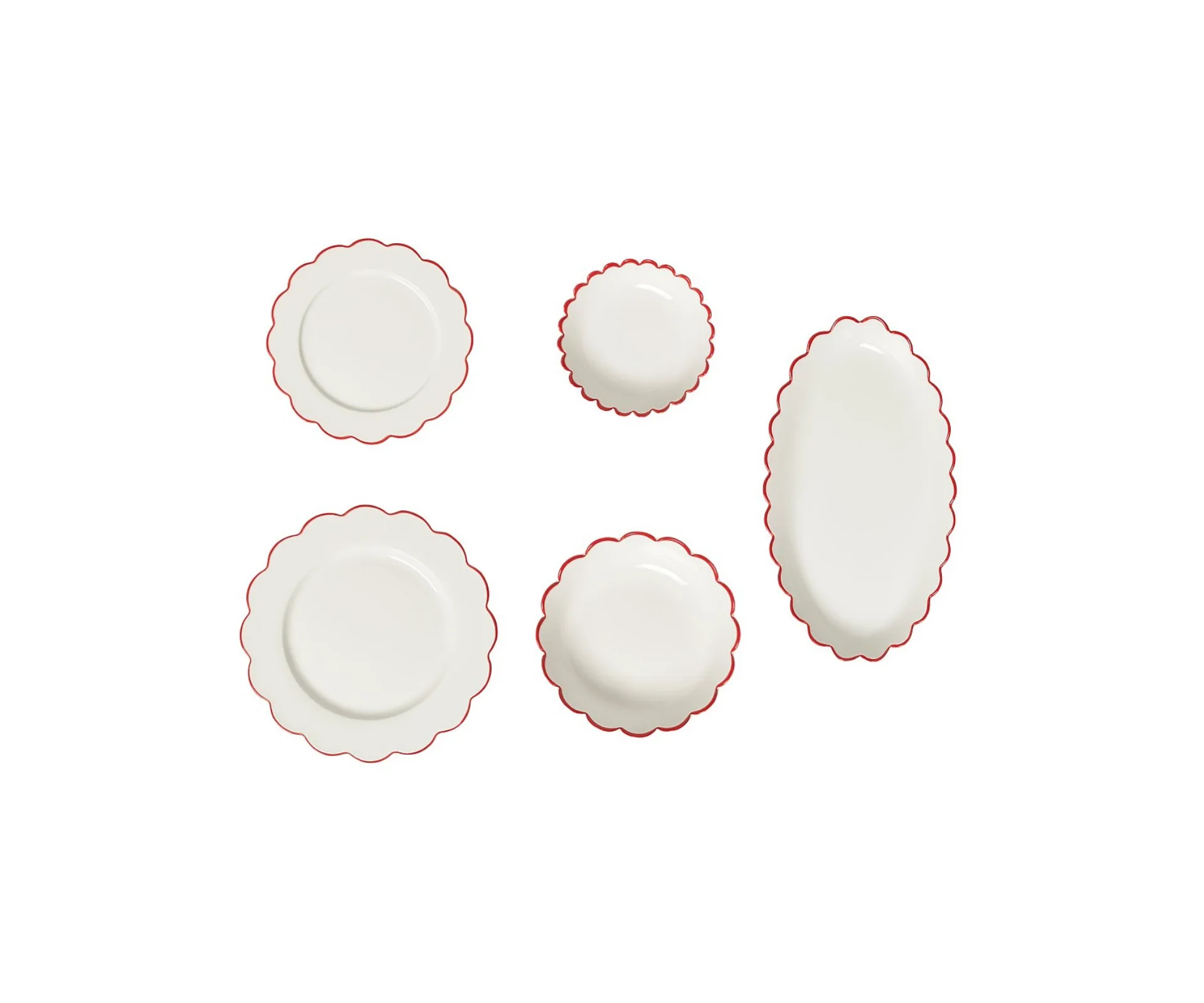 Product shot of In the Roundhouse Red Edge Scallop Dining Set (17-piece), ranked our best dinnerware set for adding a touch of whimsy. The set is white with a scalloped edge featuring a bright red outline