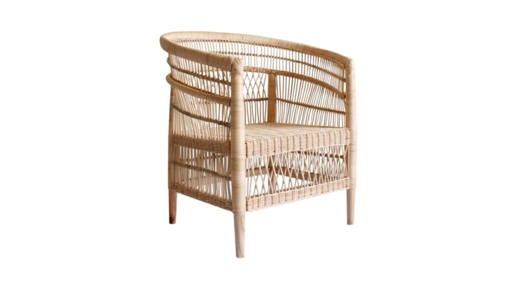 A curved rattan armchair.