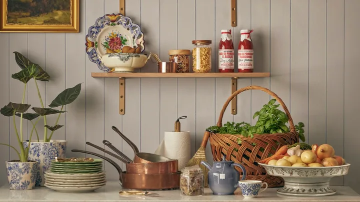 pantry with open shelves and gathered linen shelf skirt