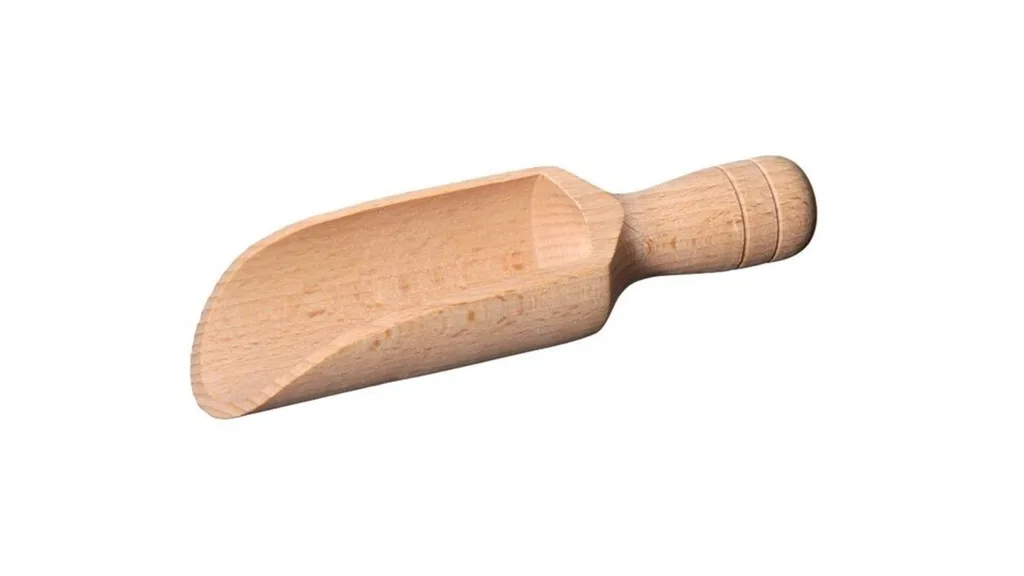 Wooden scoop with a rounded handle and a flat, shallow bowl, used for measuring or scooping dry ingredients.