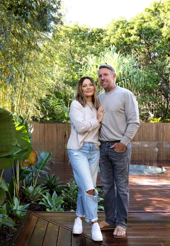 Owners Ky and Mick standing in the deck and garden area.