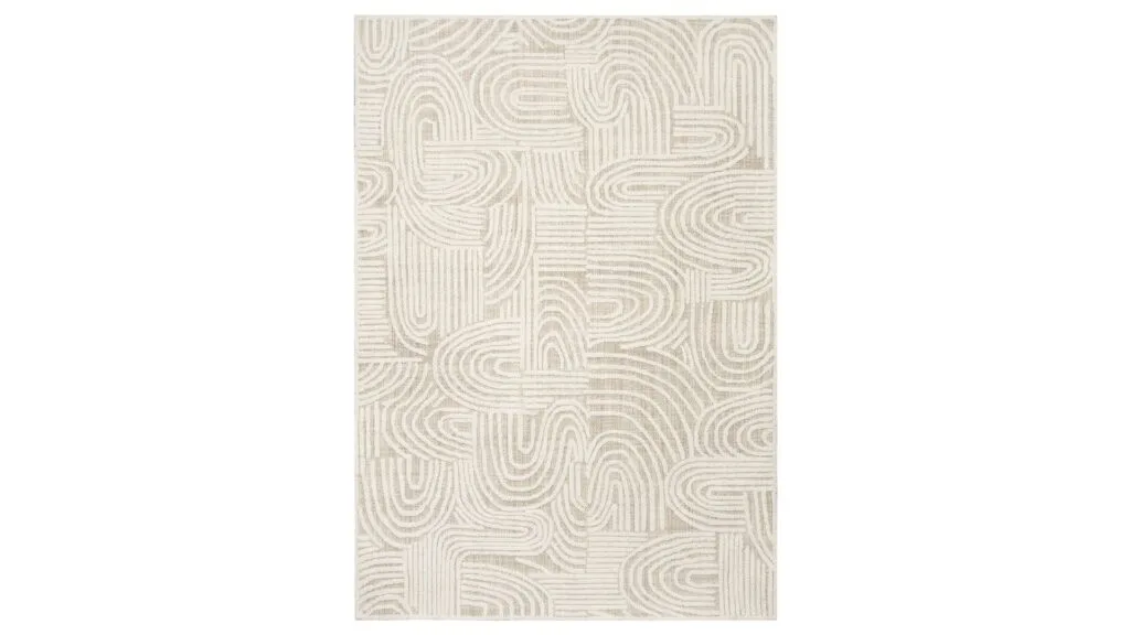 A cream and ivory rug featuring an abstract print