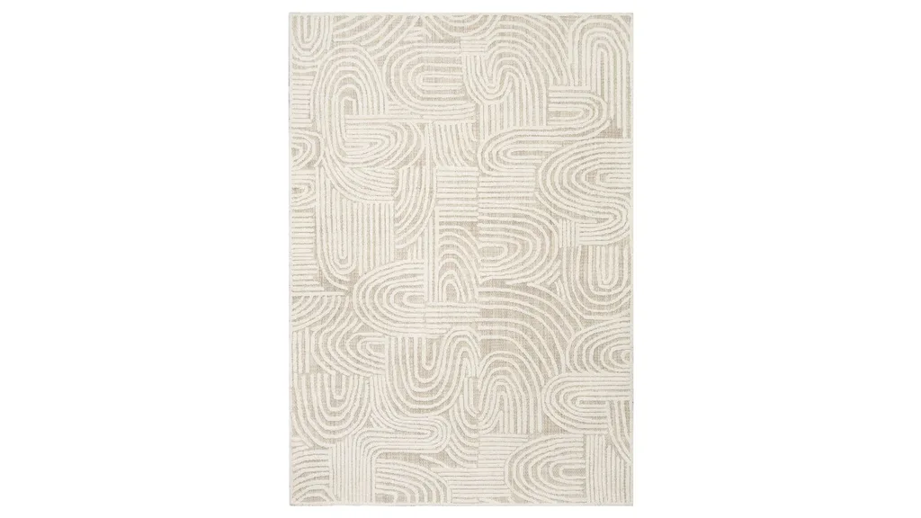 A cream and ivory rug featuring an abstract print