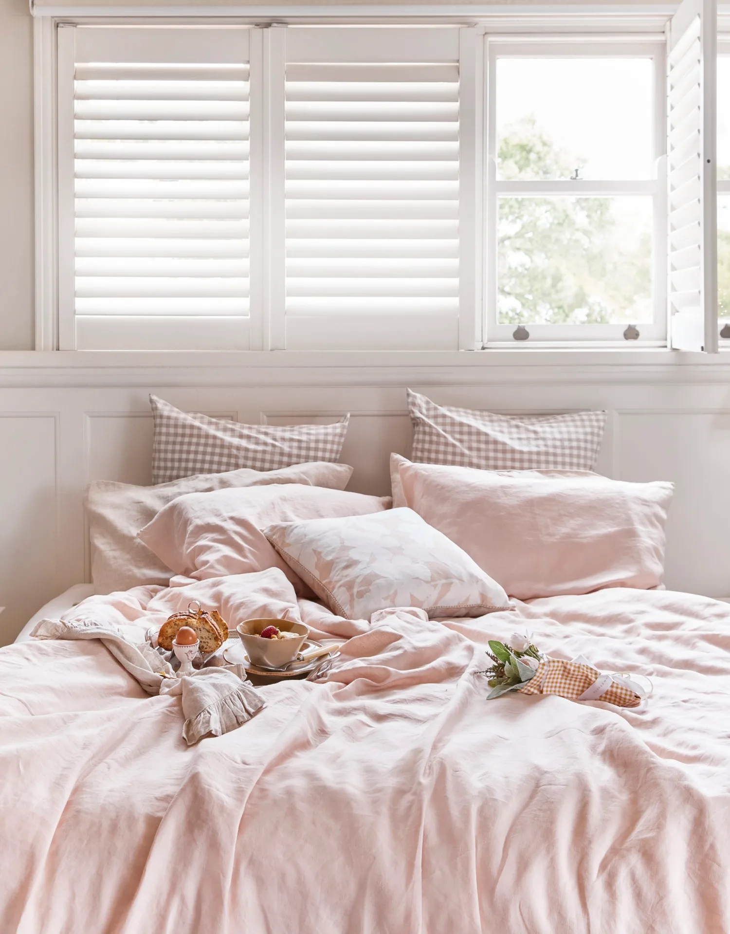 Mothers Day Breakfast In Bed Pale Pink Sheets And Flowers