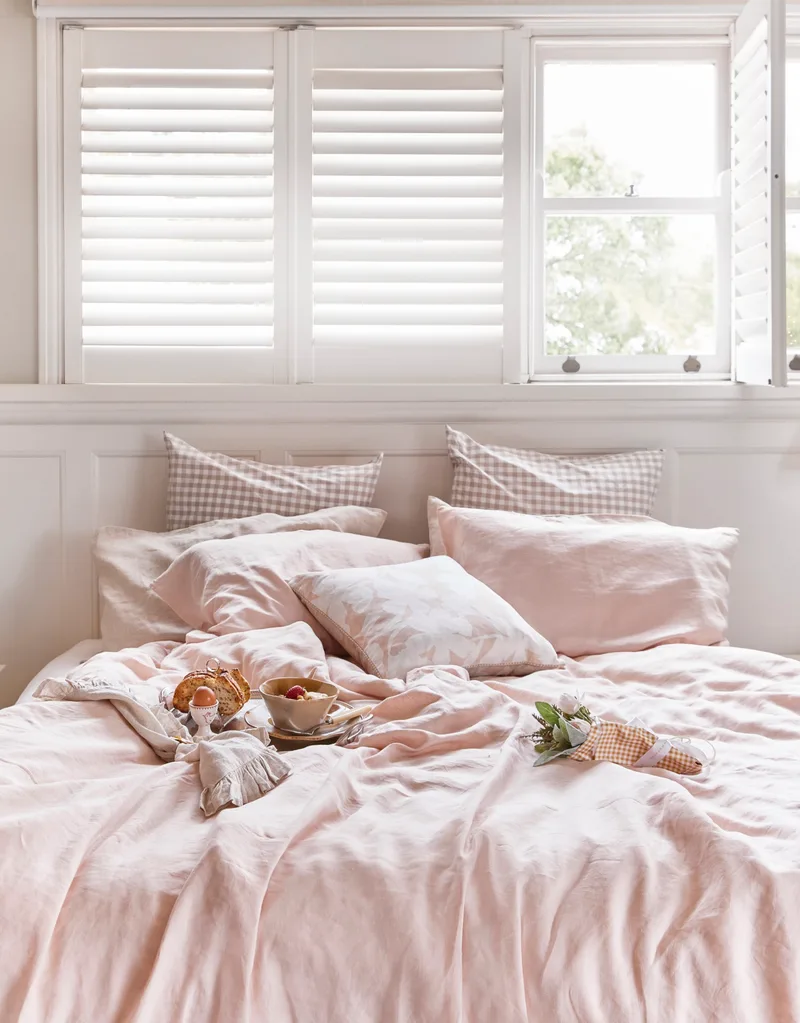 Mothers Day Breakfast In Bed Pale Pink Sheets And Flowers