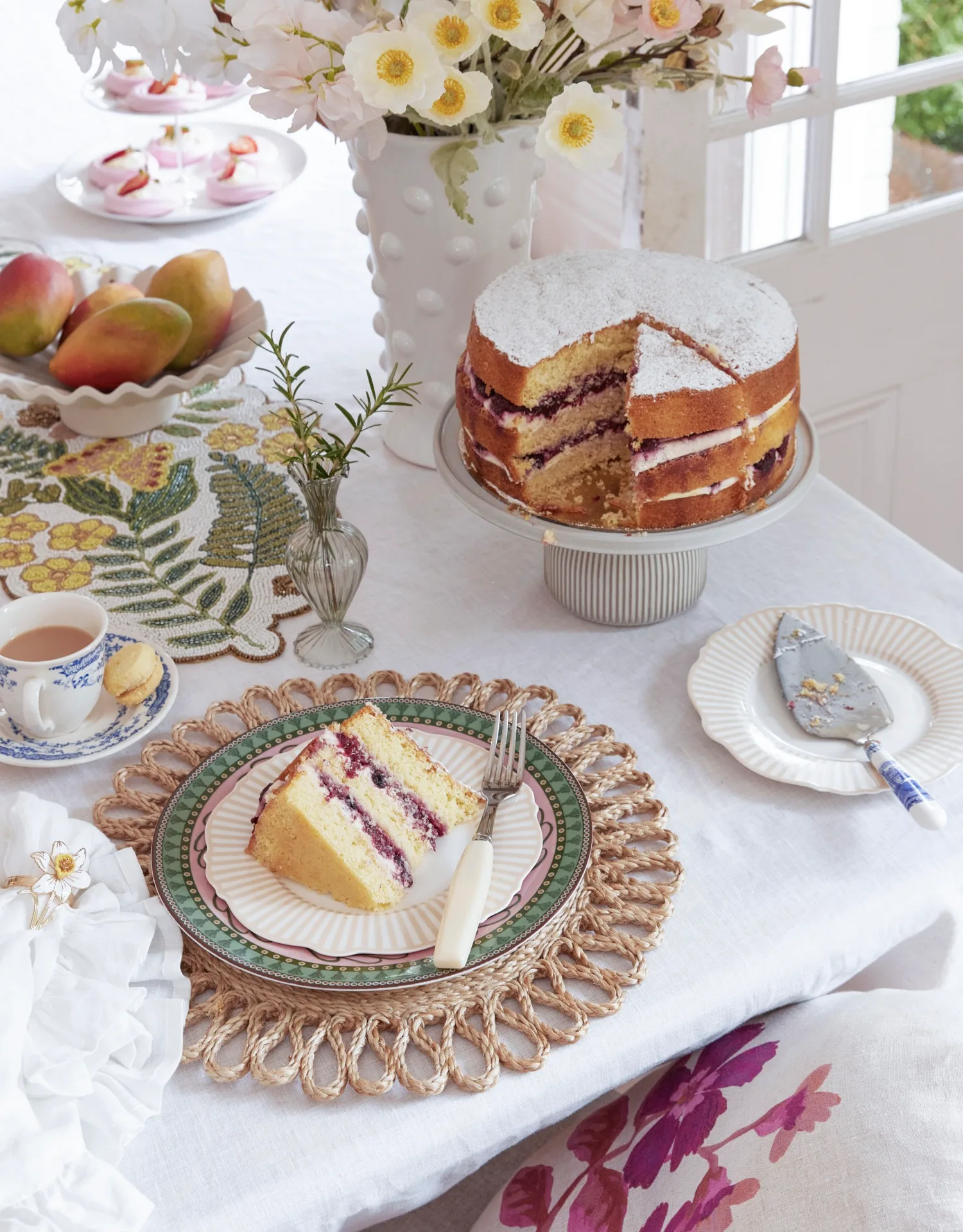 Mothers Day Brunch Table Set With Cake and Dinnerware