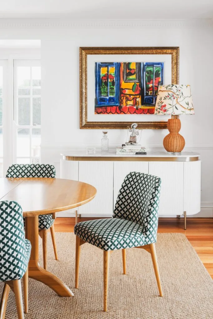 colourful-dream-home-brisbane-upholstered-dining-chairs-sideboard-art