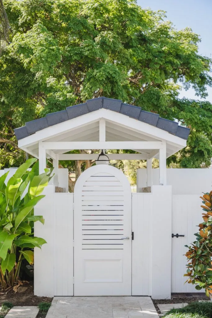 colourful-dream-home-brisbane-white-arched-front-gate