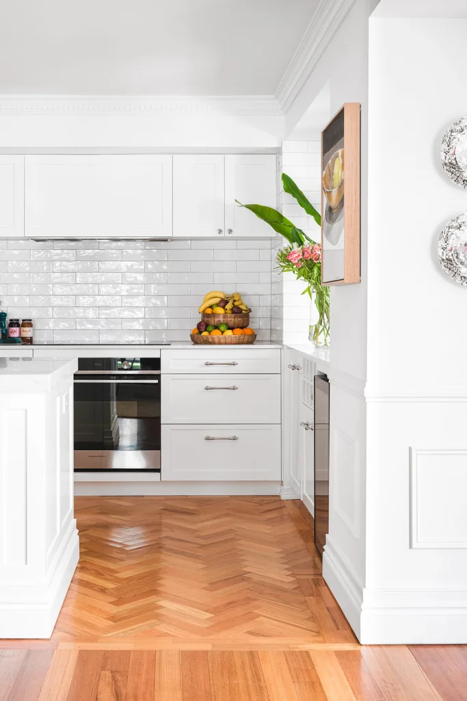 colourful-dream-home-brisbane-white-kitchen-herringbone-timber-floor