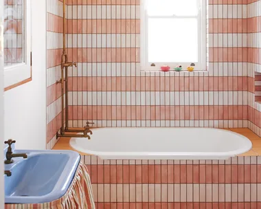 Olli Ella cofounder Chloe Brookman home kids bathroom stripe tile pattern sink skirt