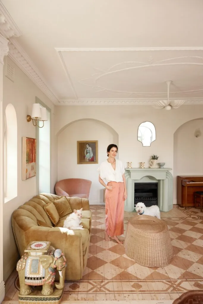 Olli Ella cofounder Chloe Brookman home living room with dog and wooden floor