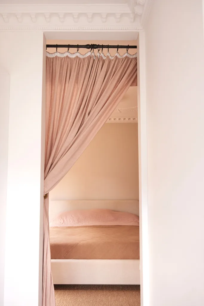 Olli Ella cofounder Chloe Brookman home main bedroom velvet curtain door