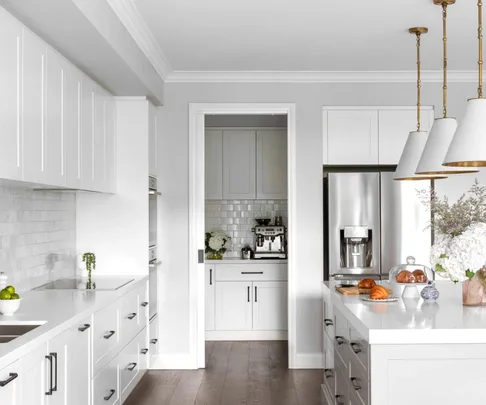 image of kitchen with coffee machine and fridge
