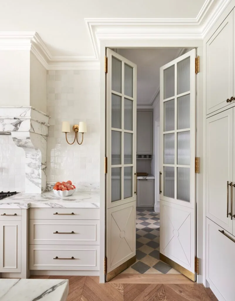 White French doors opening into a butler's pantry.