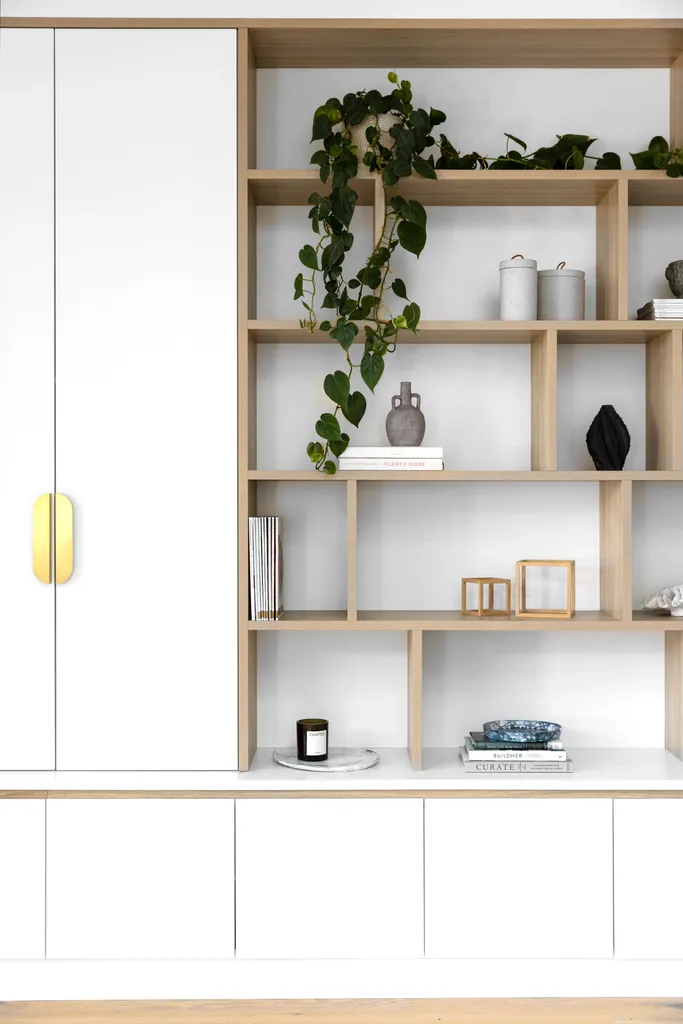 Timber open shelving and white cabinetry.