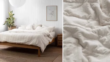 Minimalist bedroom with a neatly made bed, white bedding, and a potted plant next to a wooden nightstand.