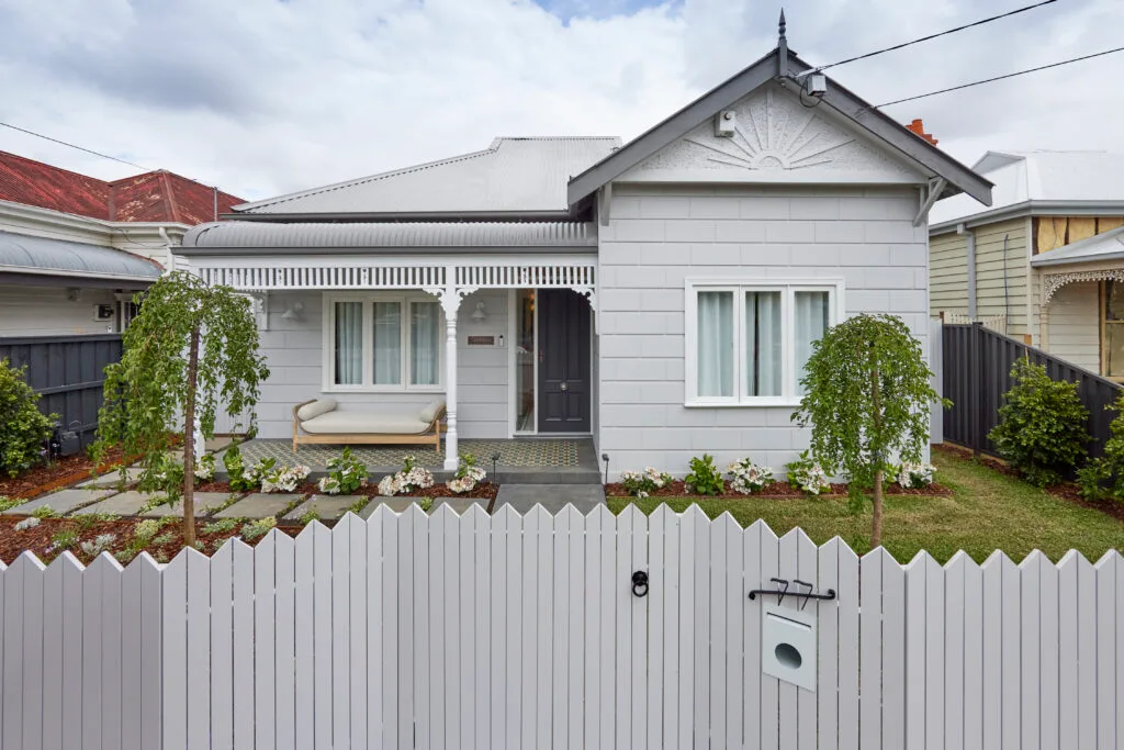 Brad and Mel from Dream Home's new front fence is modern and matches the bluey grey house.