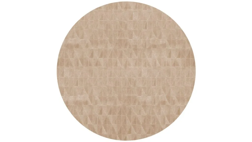 A round rug in a caramel tone