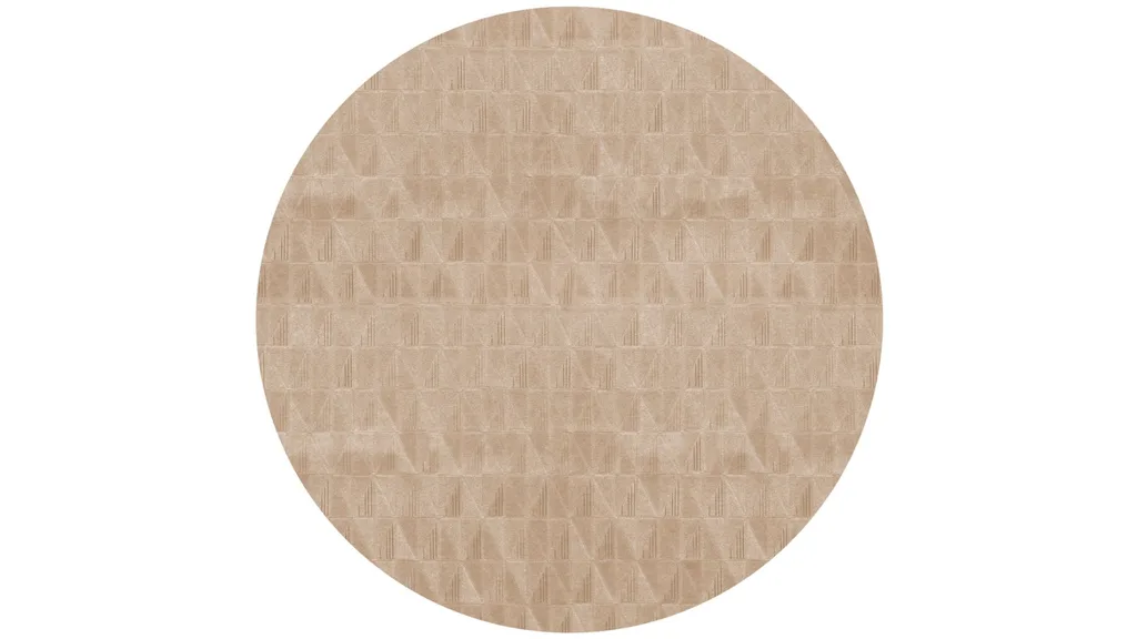 A round rug in a caramel tone