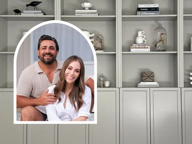 The completed custom-look cabinetry painted in a chic grey with products styled on and The Block couple Ronnie and Georgia smiling inset.