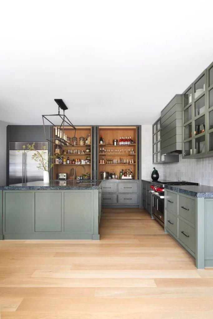 A modern farmhouse kitchen with greige cabinetry.