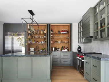 A modern farmhouse kitchen with greige cabinetry.