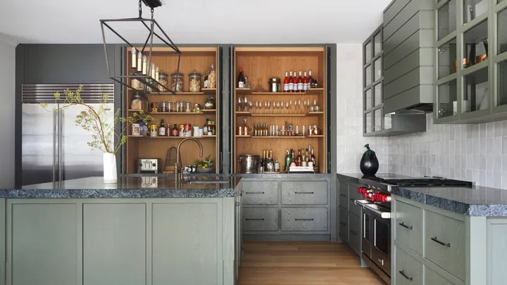 A modern farmhouse kitchen with greige cabinetry.