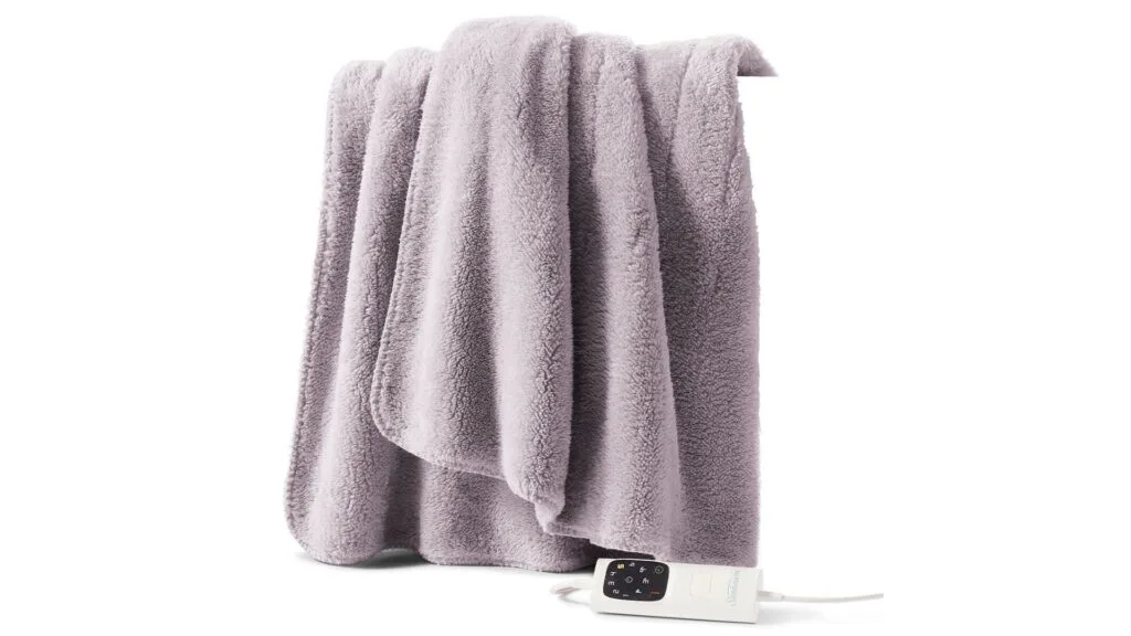 A grey electric throw blanket with controller.