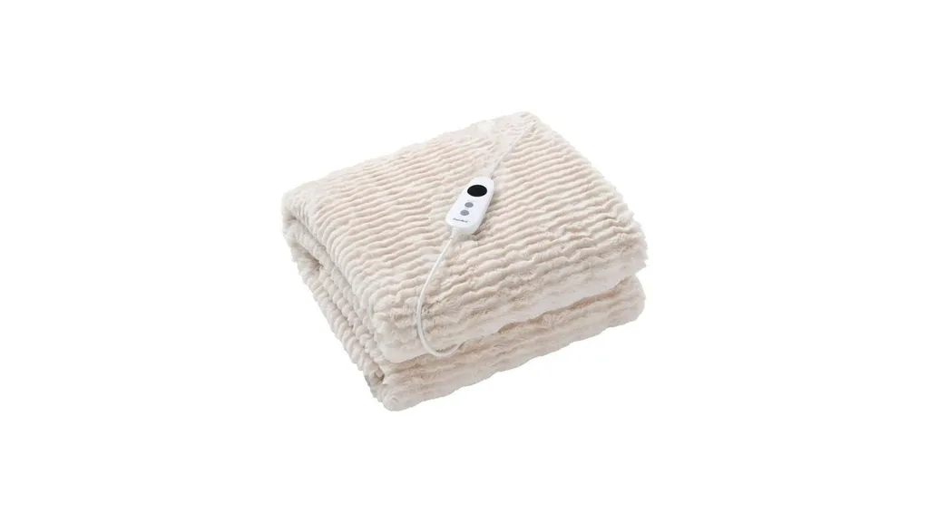 A cream electric throw blanket with controller.