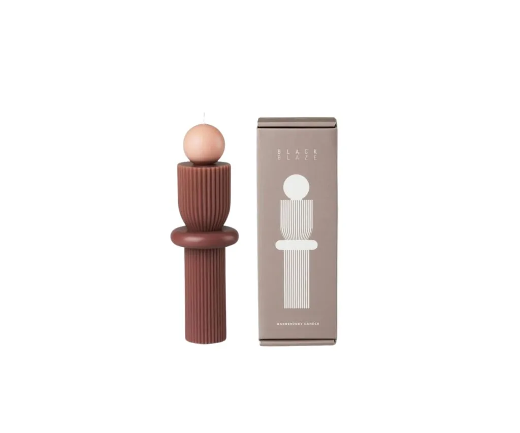 Ball and ribbed base unscented candle in modern sculptural style