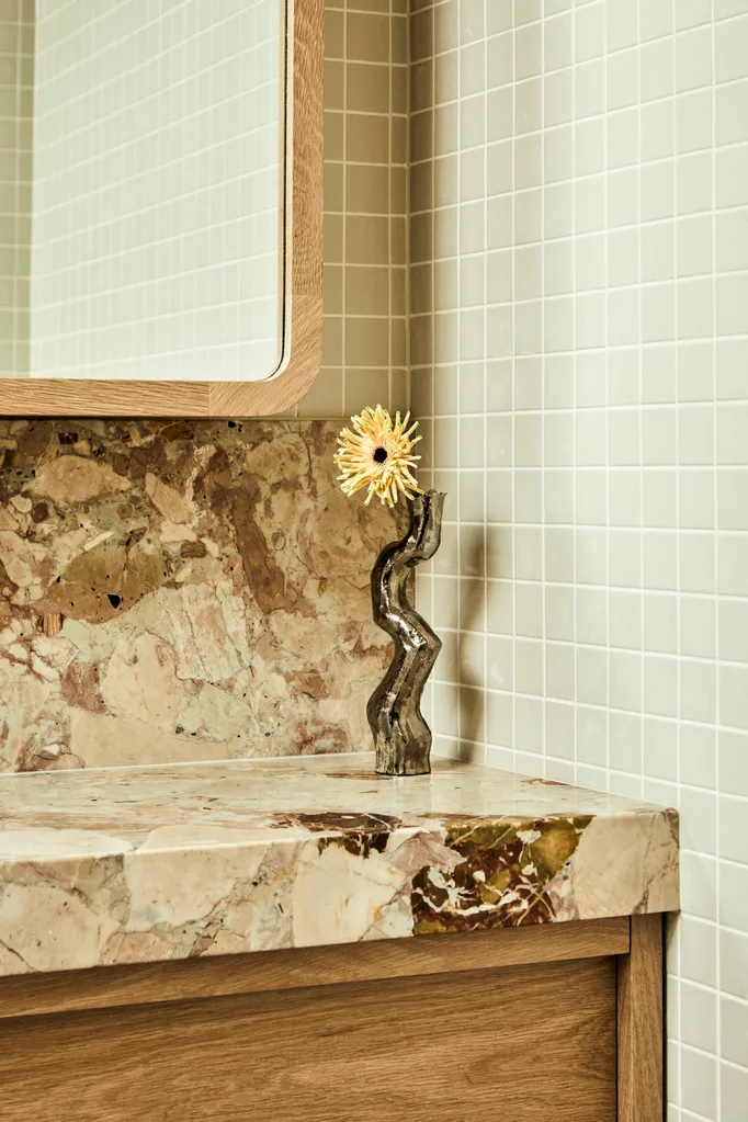 Darren Palmer's Bondi home bathroom vanity with vase.
