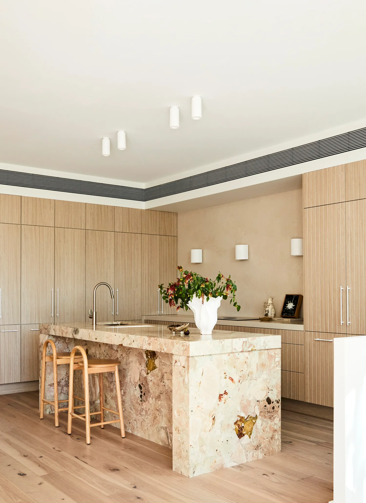 Darren Palmer's Bondi home kitchen with marble island.