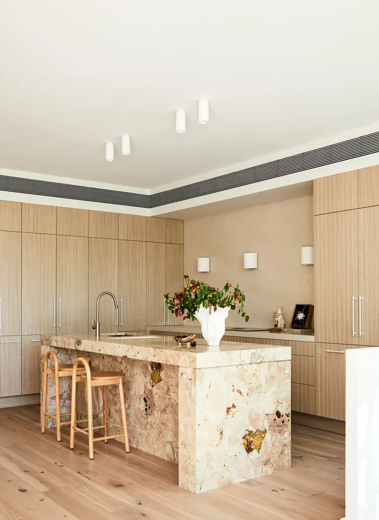 Darren Palmer's Bondi home kitchen with marble island.