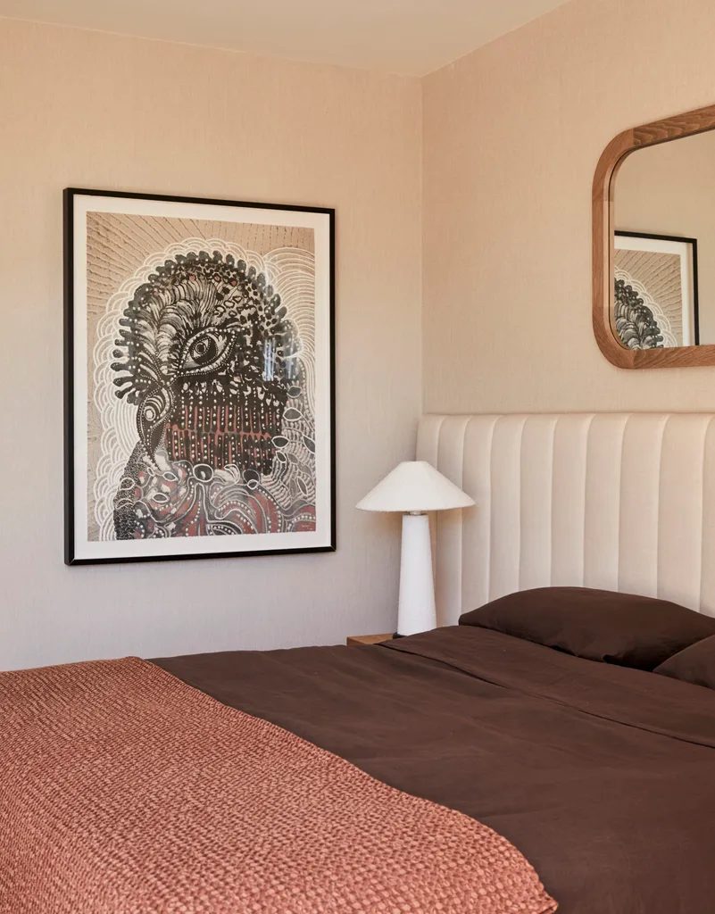 Darren Palmer home main bedroom with large bird artwork.