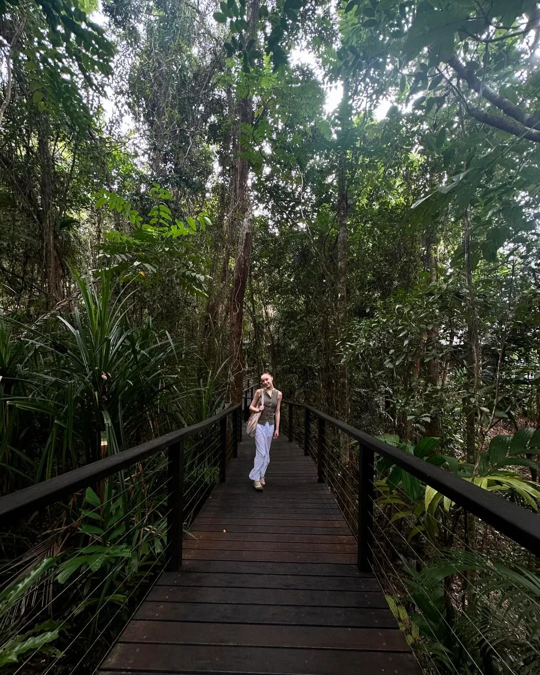 Phoebe Dynevor in rainforest at Silky Oaks Lodge