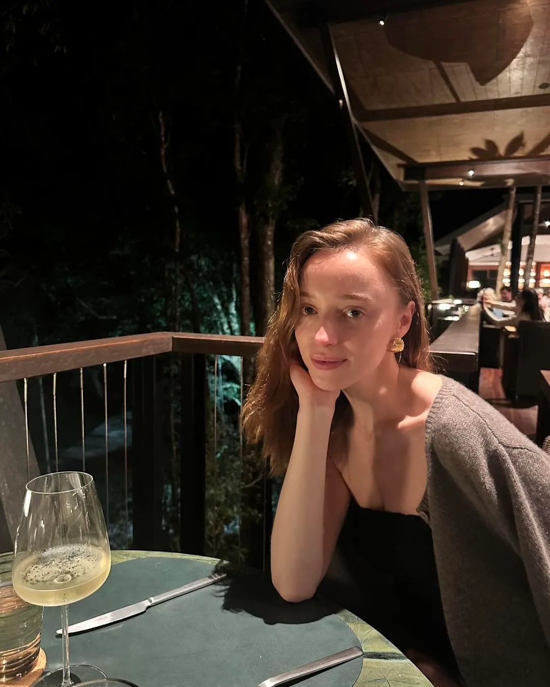 Phoebe Dynevor in the dining area at Silky Oaks Lodge