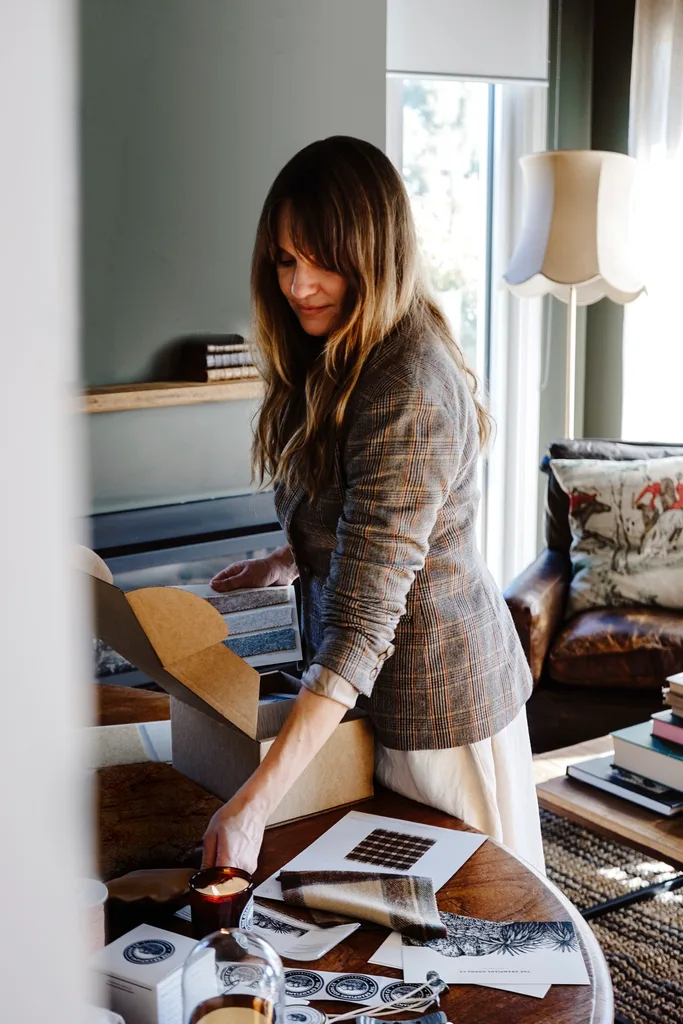 Amanda Cochran packing a Grampians Goods Co. box.