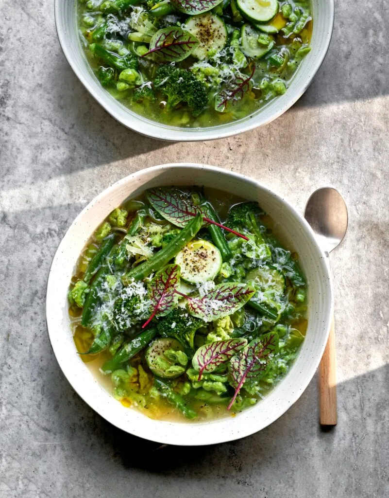 Green minestrone soup with dumplings.