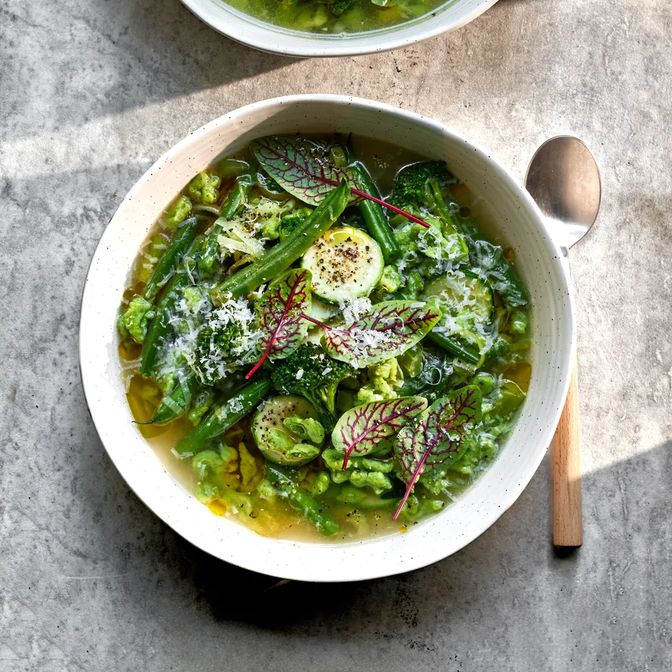 Green minestrone soup with dumplings.