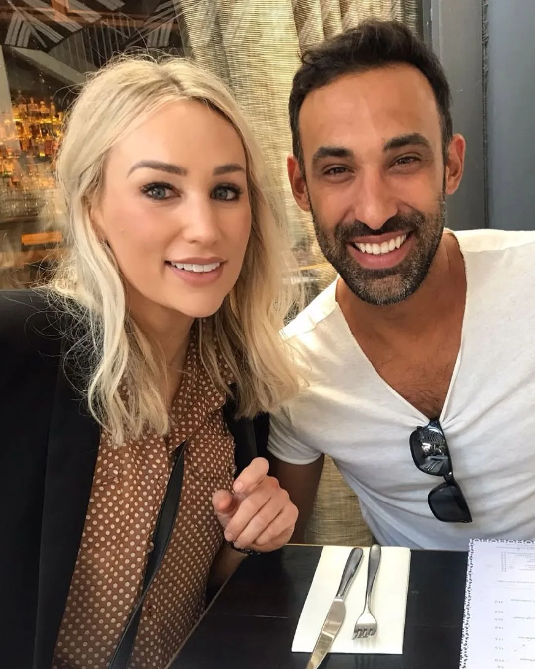 reality tv renovation couple adam and lisa smile for a selfie