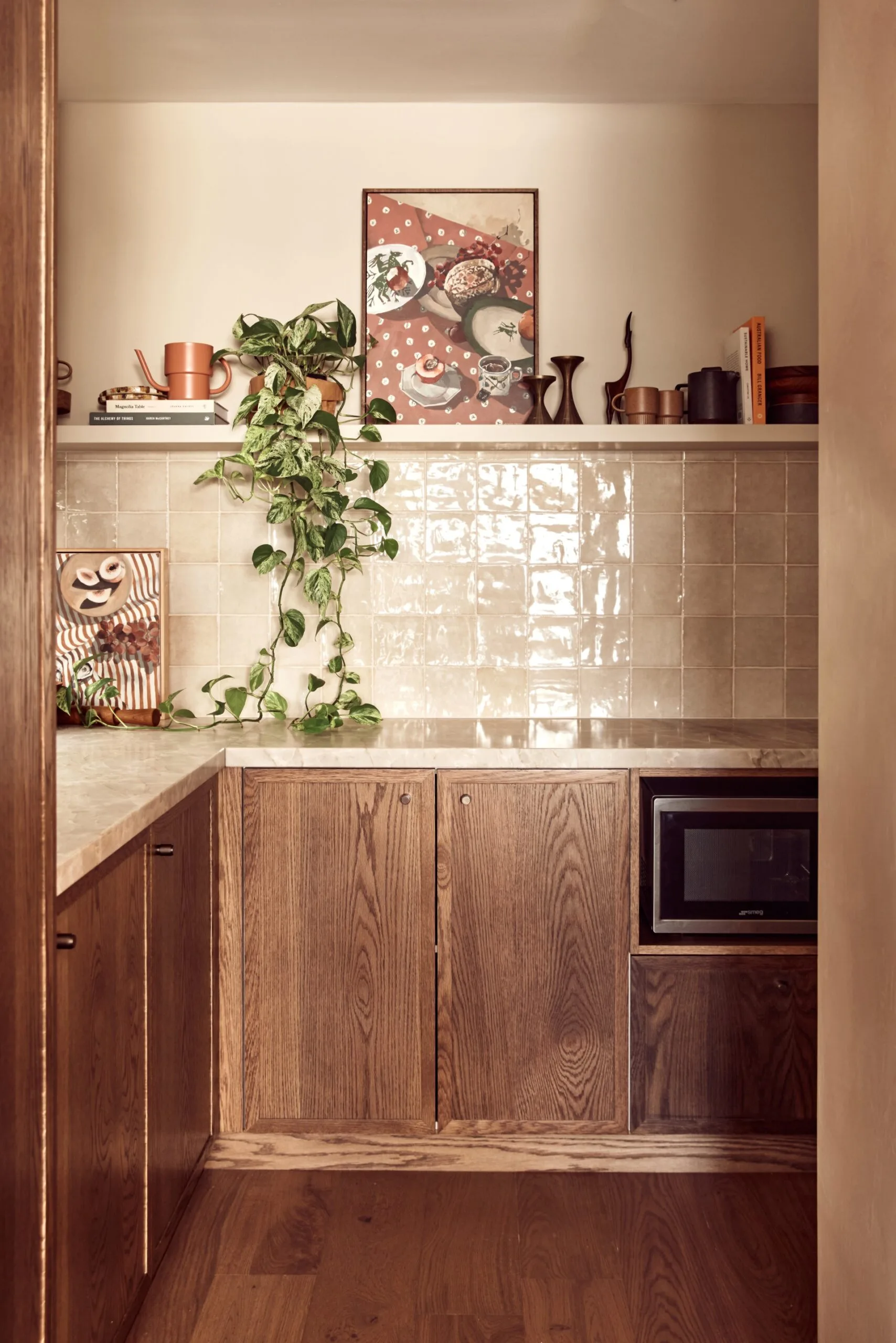 A Spanish resort style kitchen with timber joinery.