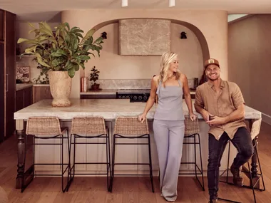 Kyal and Kara in the Spanish resort style kitchen.