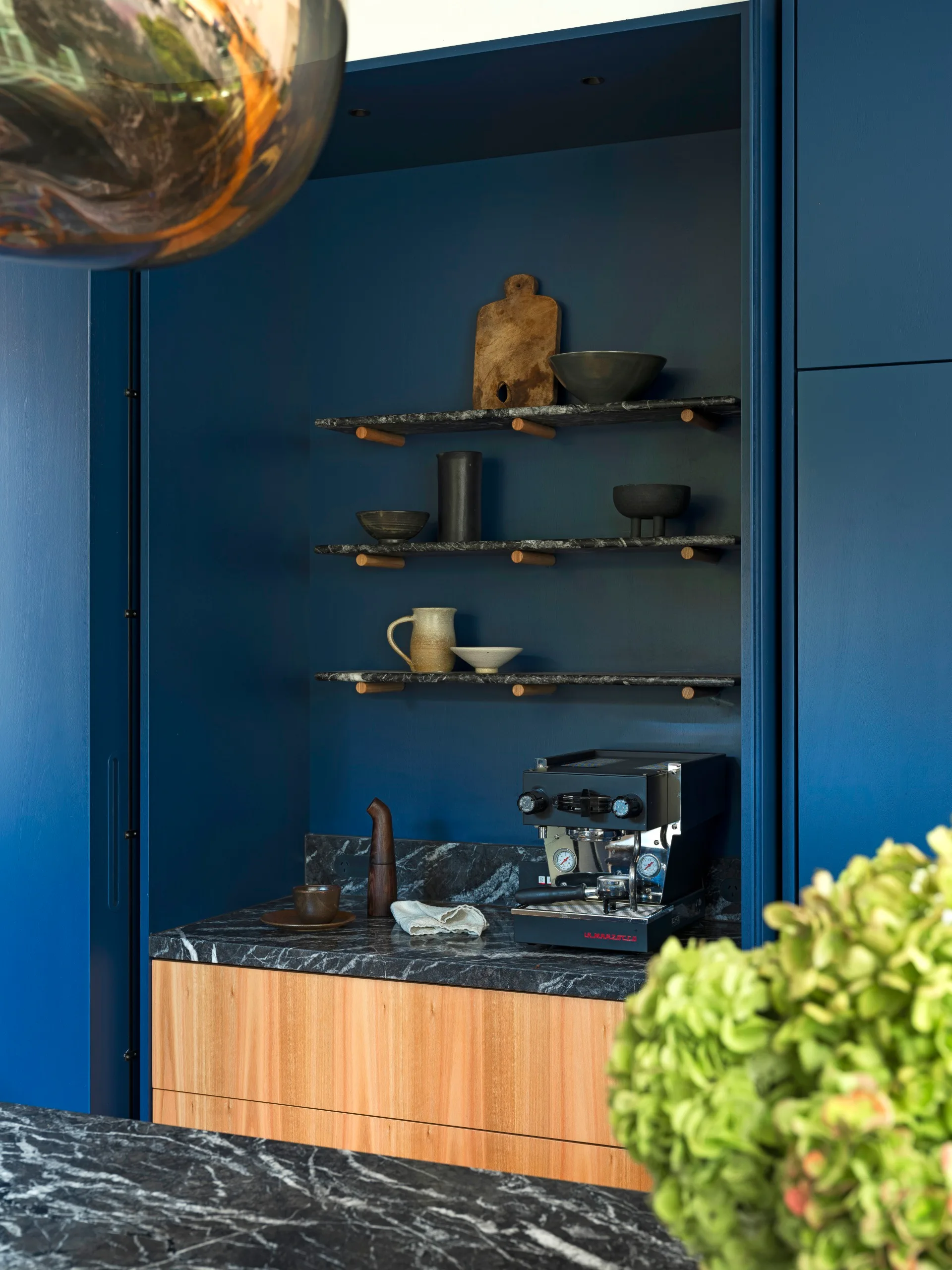 Blue open shelving. 