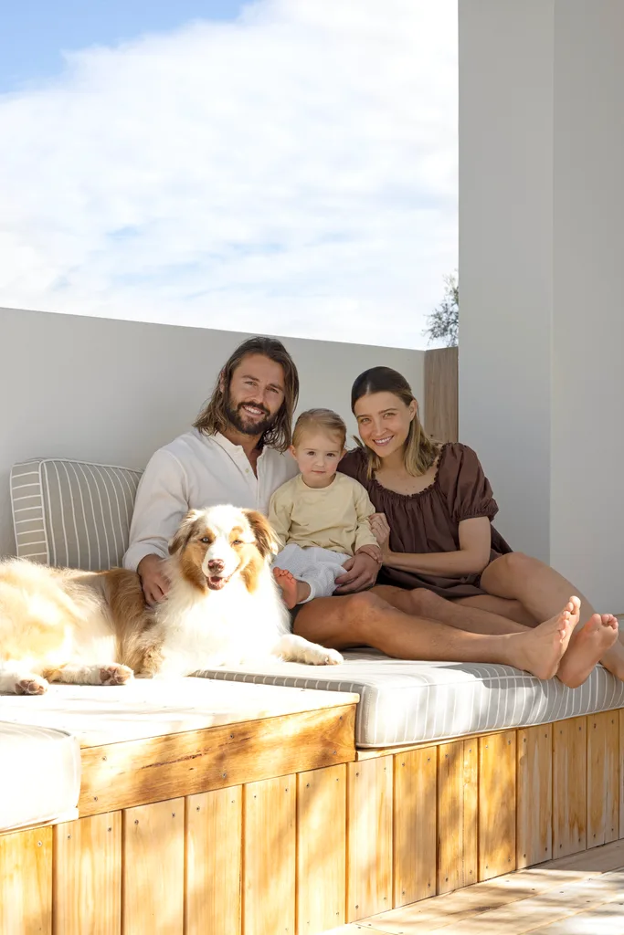 Nicola and Lachie Waller with their daughter and dog. 