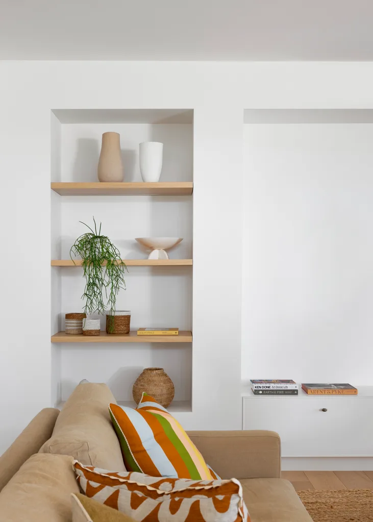 Nicola and Lachie Waller's open shelving in living room. 