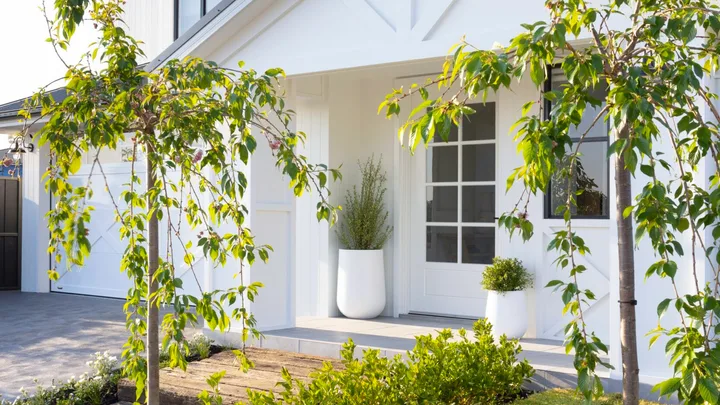 The exterior of an American barn style home.