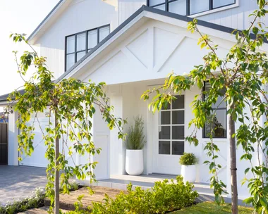 The exterior of an American barn style home.