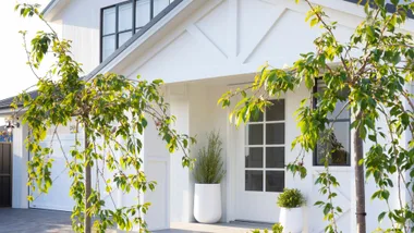 The exterior of an American barn style property.