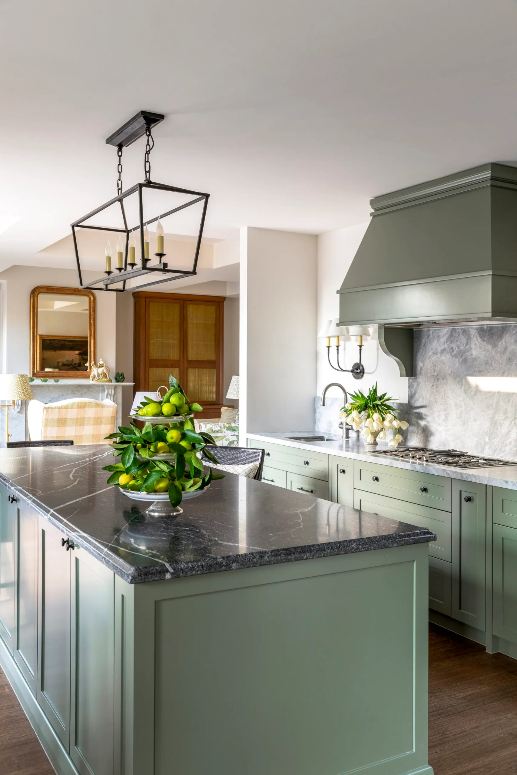 A green country style kitchen. 