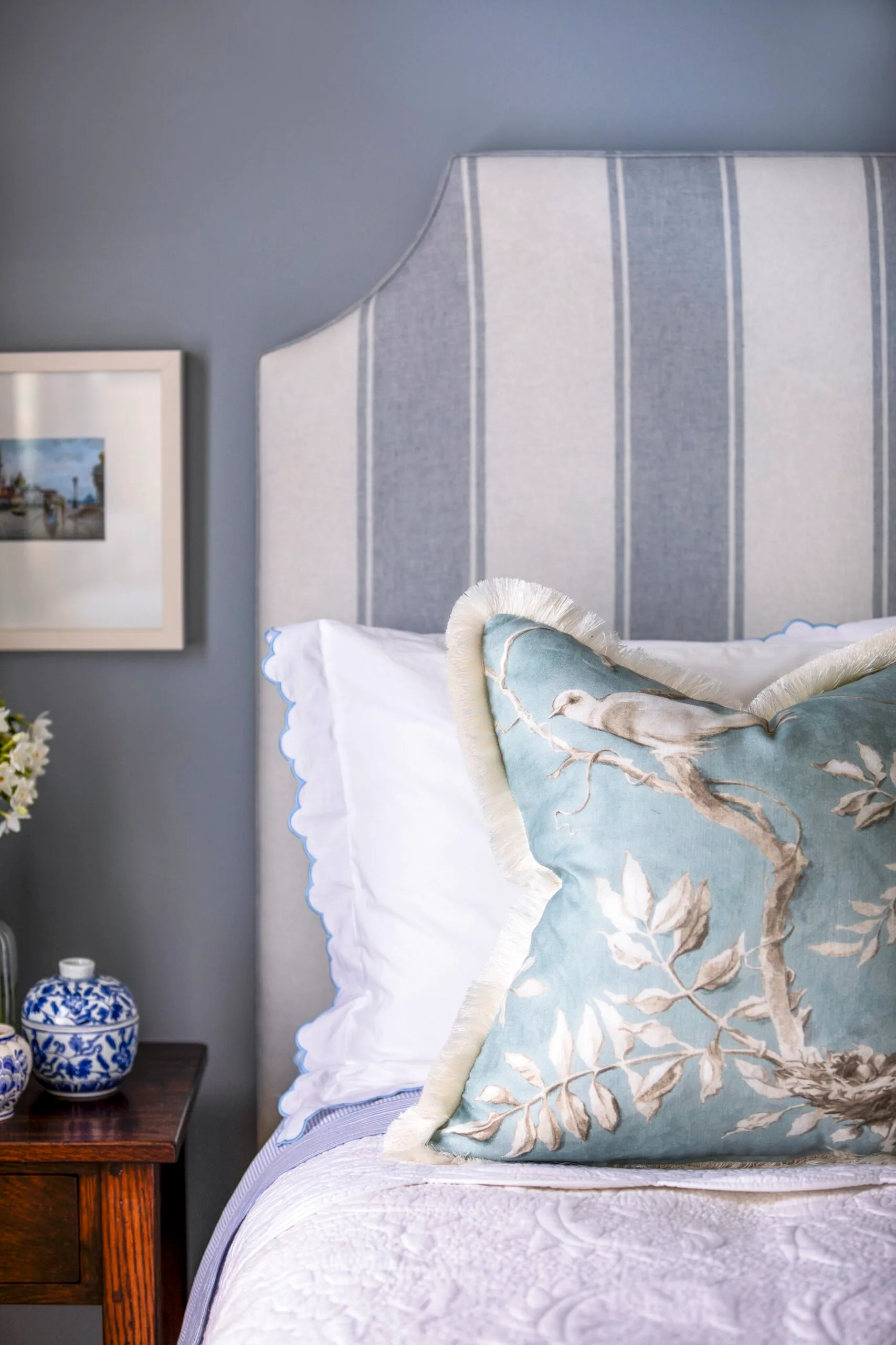 Blue striped bedhead and bedroom in South Yarra. 